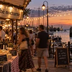 Marché nocturne port médoc : quais et étals au bord de l’estuaire, golden hour
